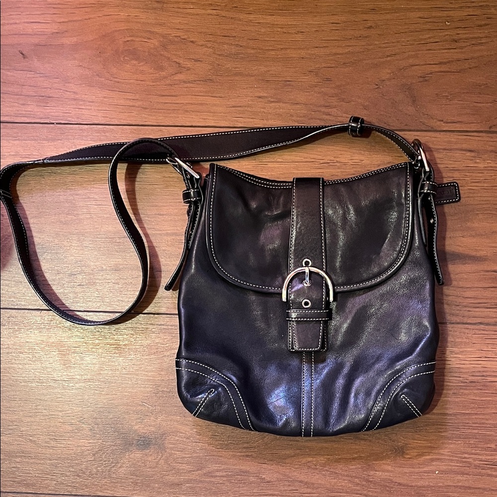 Coach Black Leather Crossbody Bag with classic tan/brown coach interior.